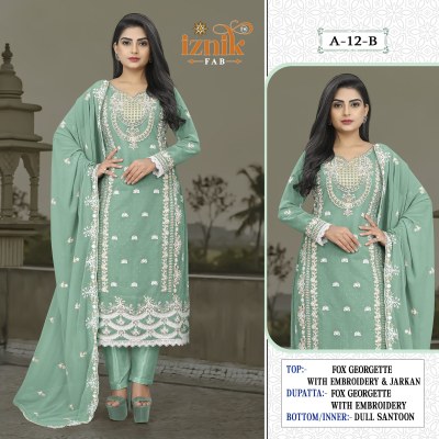 A 12 by IZNIK FAB Heavy embroidered Georgette Pakistani suit catalogue pakistani suit catalogs